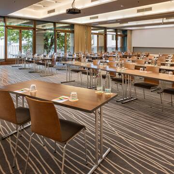 a room with tables and chairs