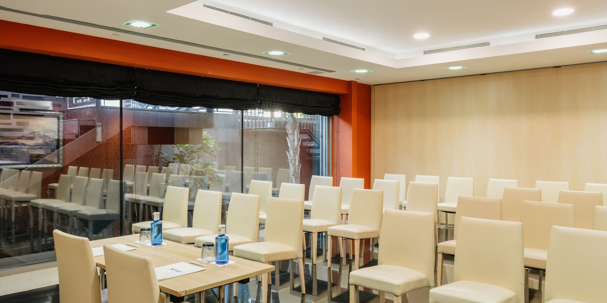 a room with chairs and tables