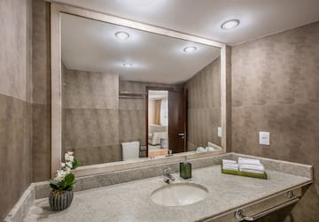 a bathroom with a large mirror