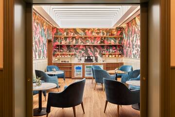 a room with tables and chairs
