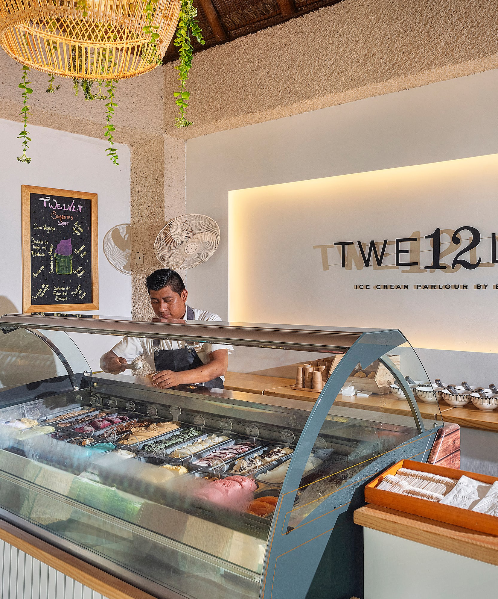 a man behind a glass case