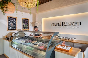 a man behind a glass case