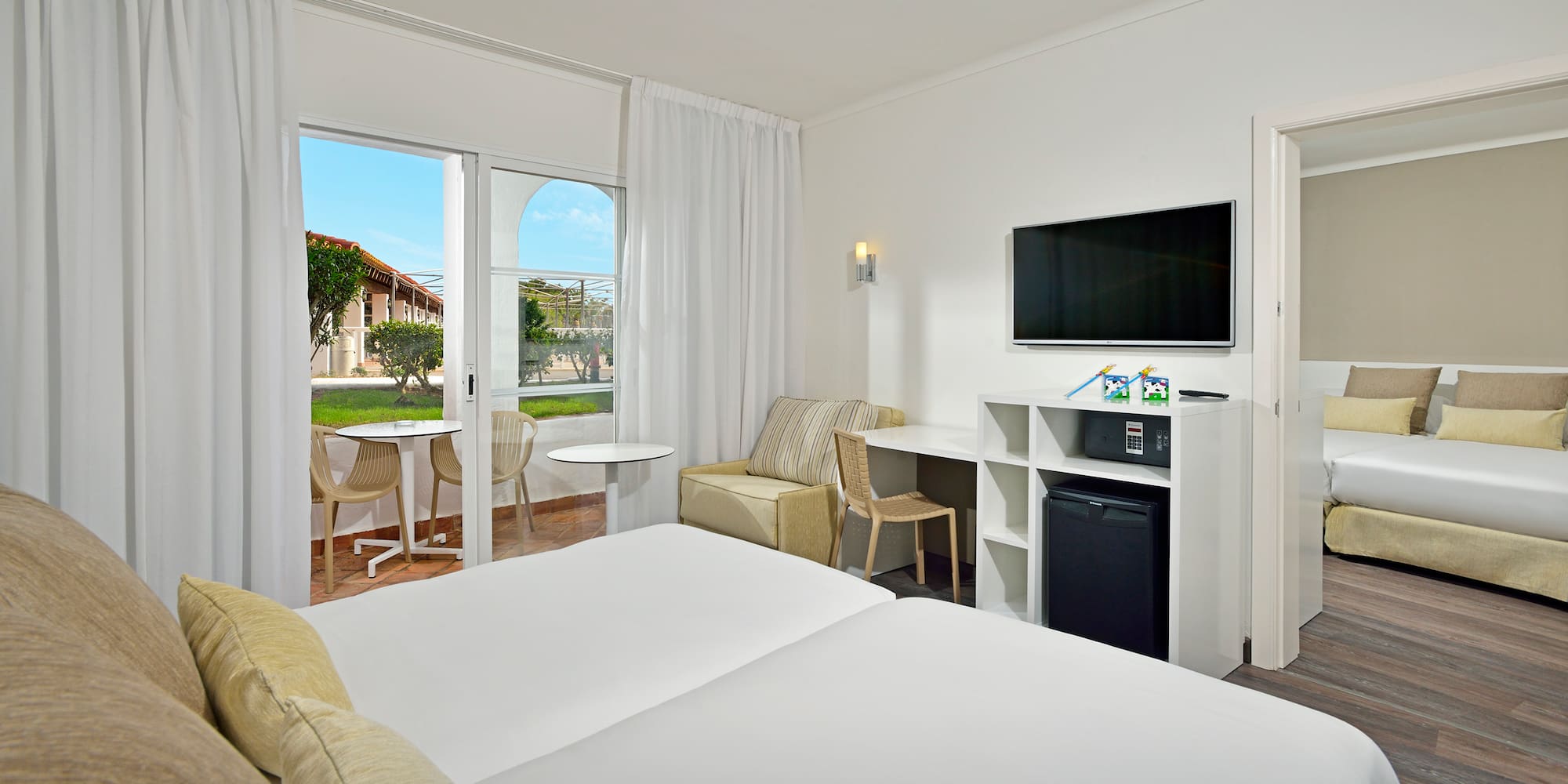 a room with a television and a table