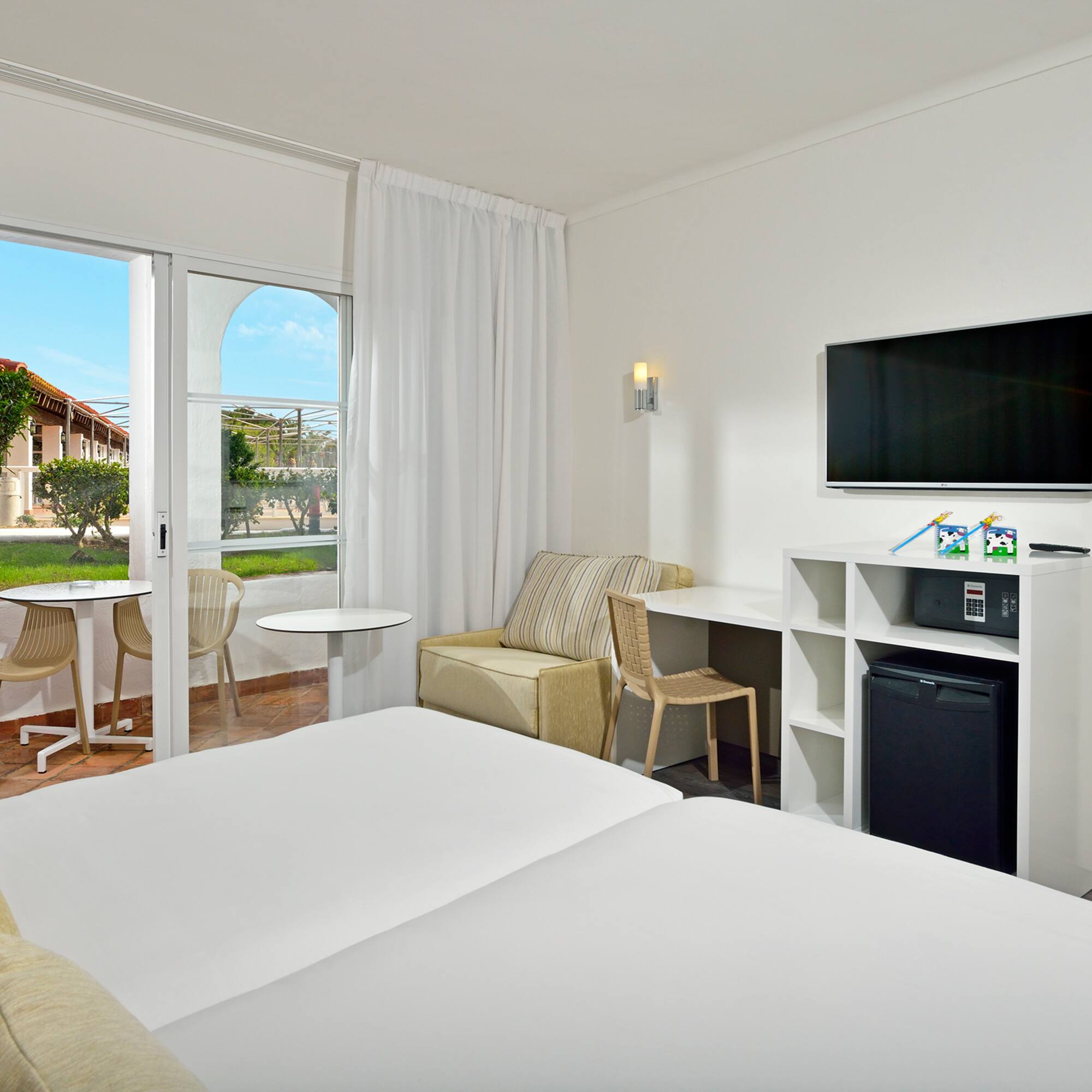 a room with a television and a table