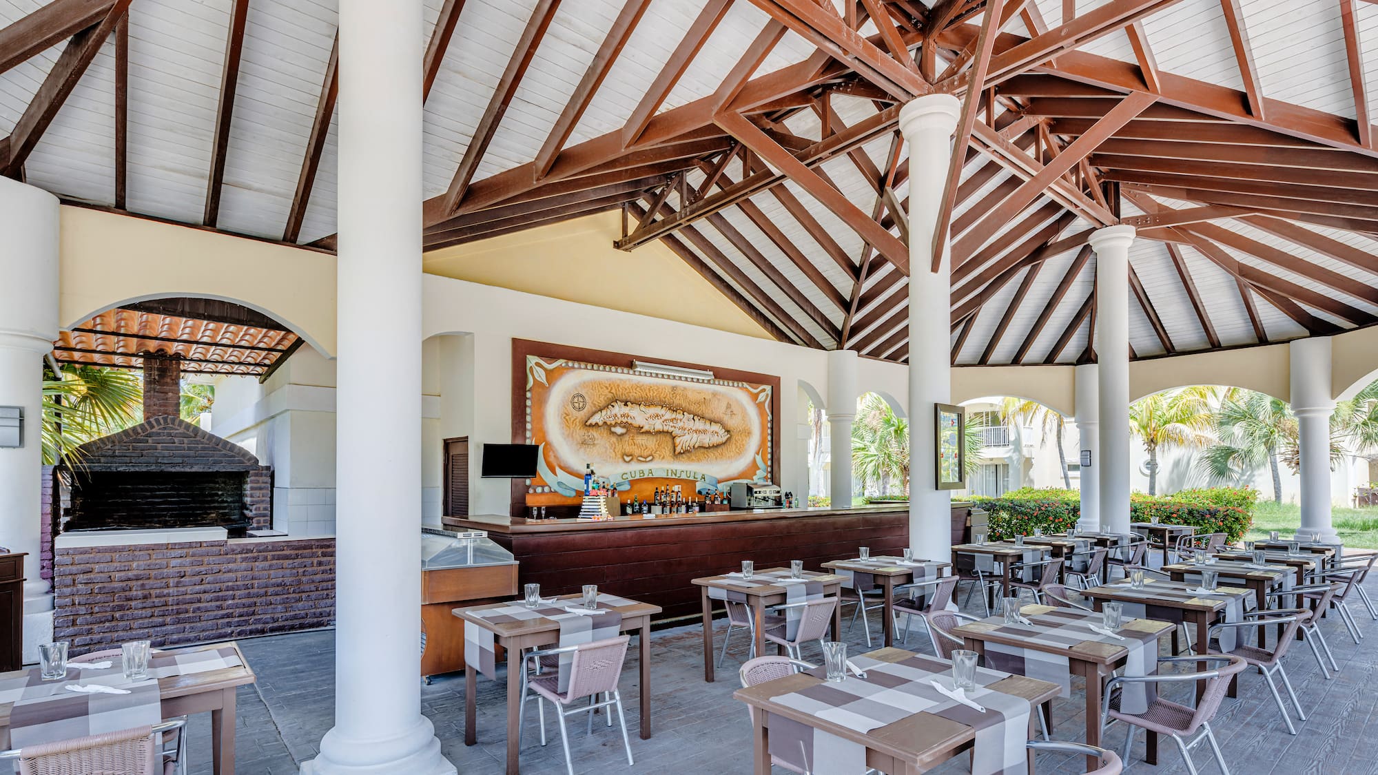 a restaurant with tables and chairs