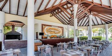 a restaurant with tables and chairs