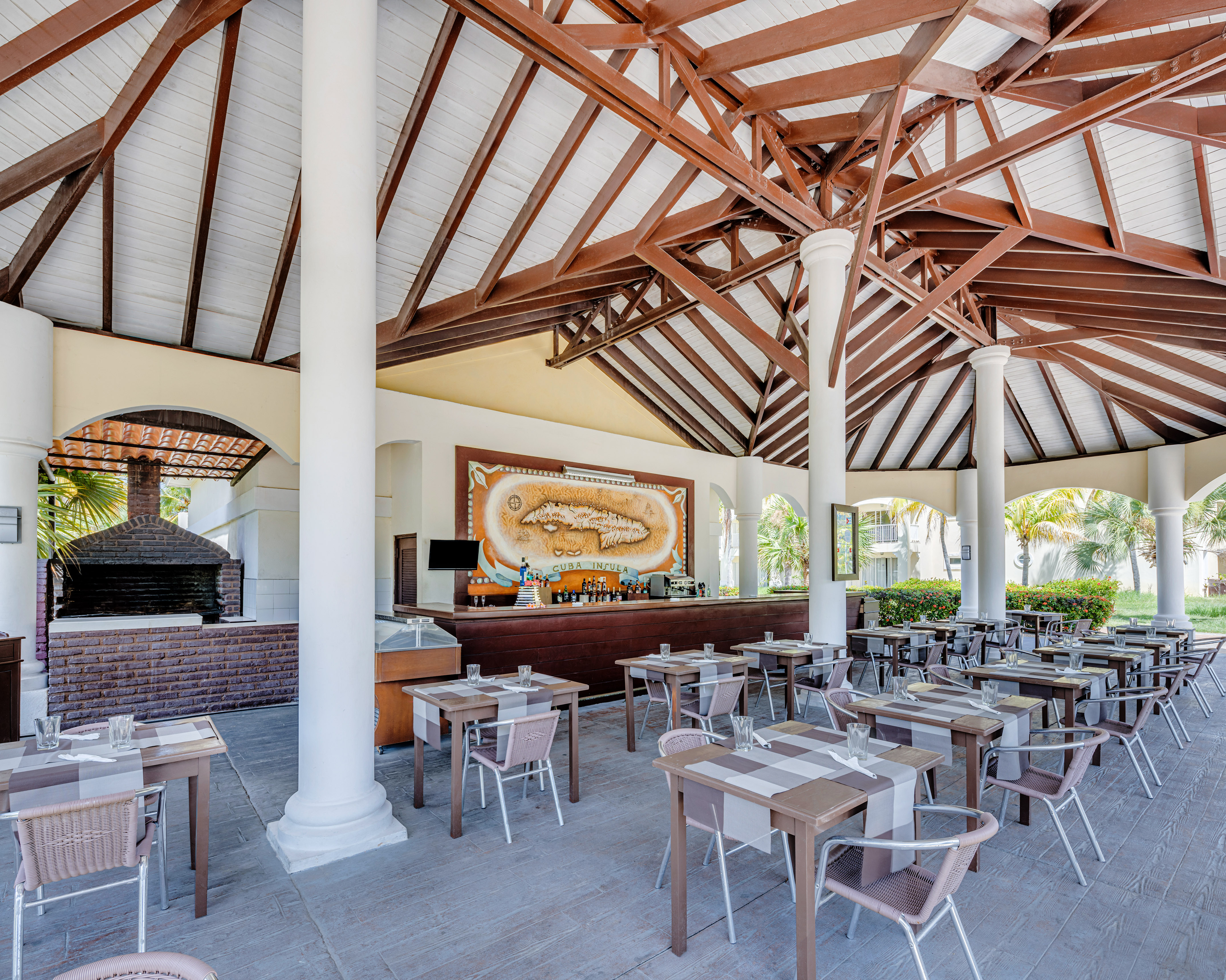 a restaurant with tables and chairs