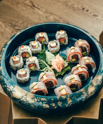 a plate of sushi on a table