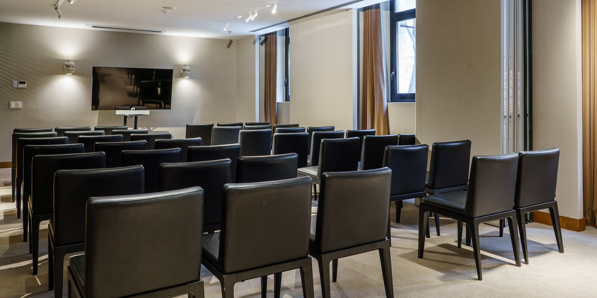 a room with black chairs
