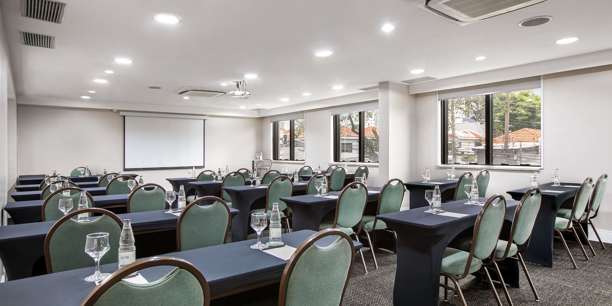 a room with tables and chairs