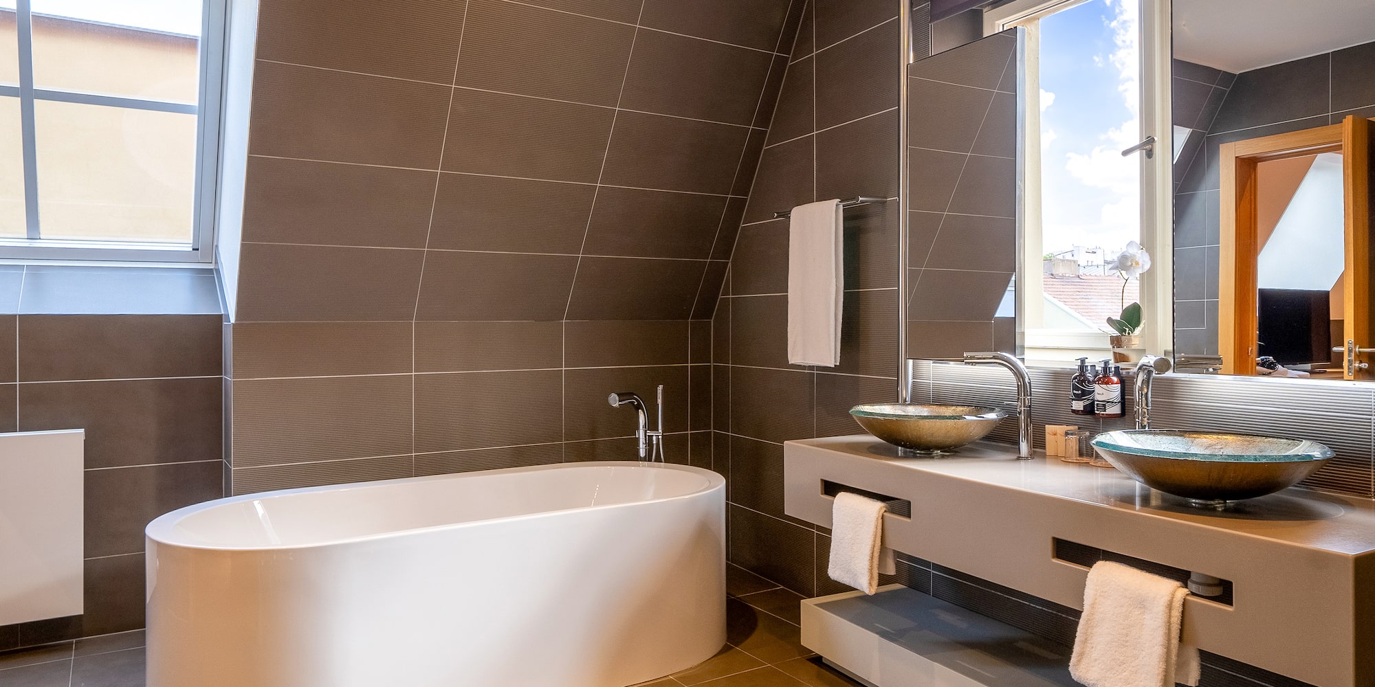 a bathroom with a tub and sink
