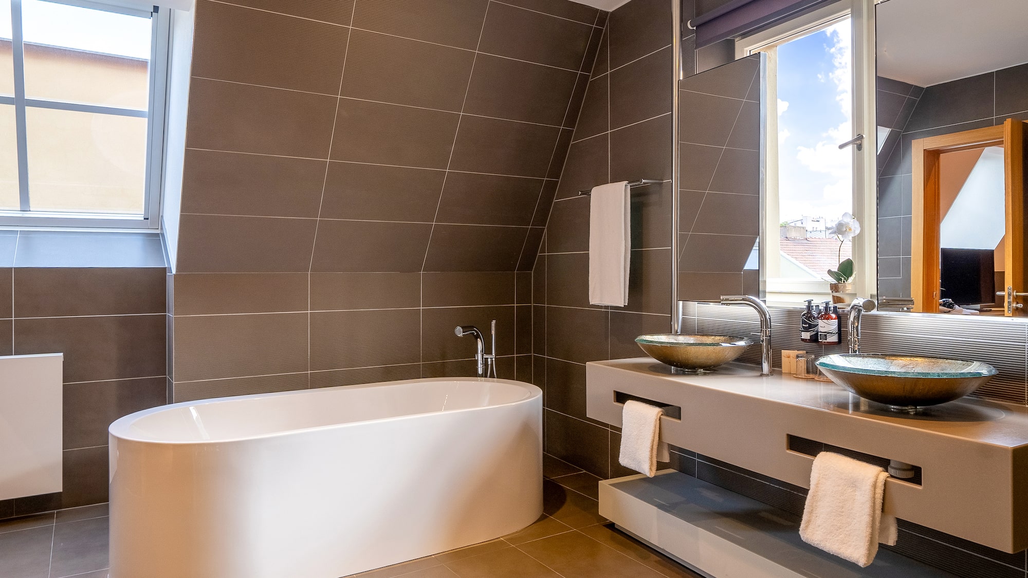 a bathroom with a tub and sink