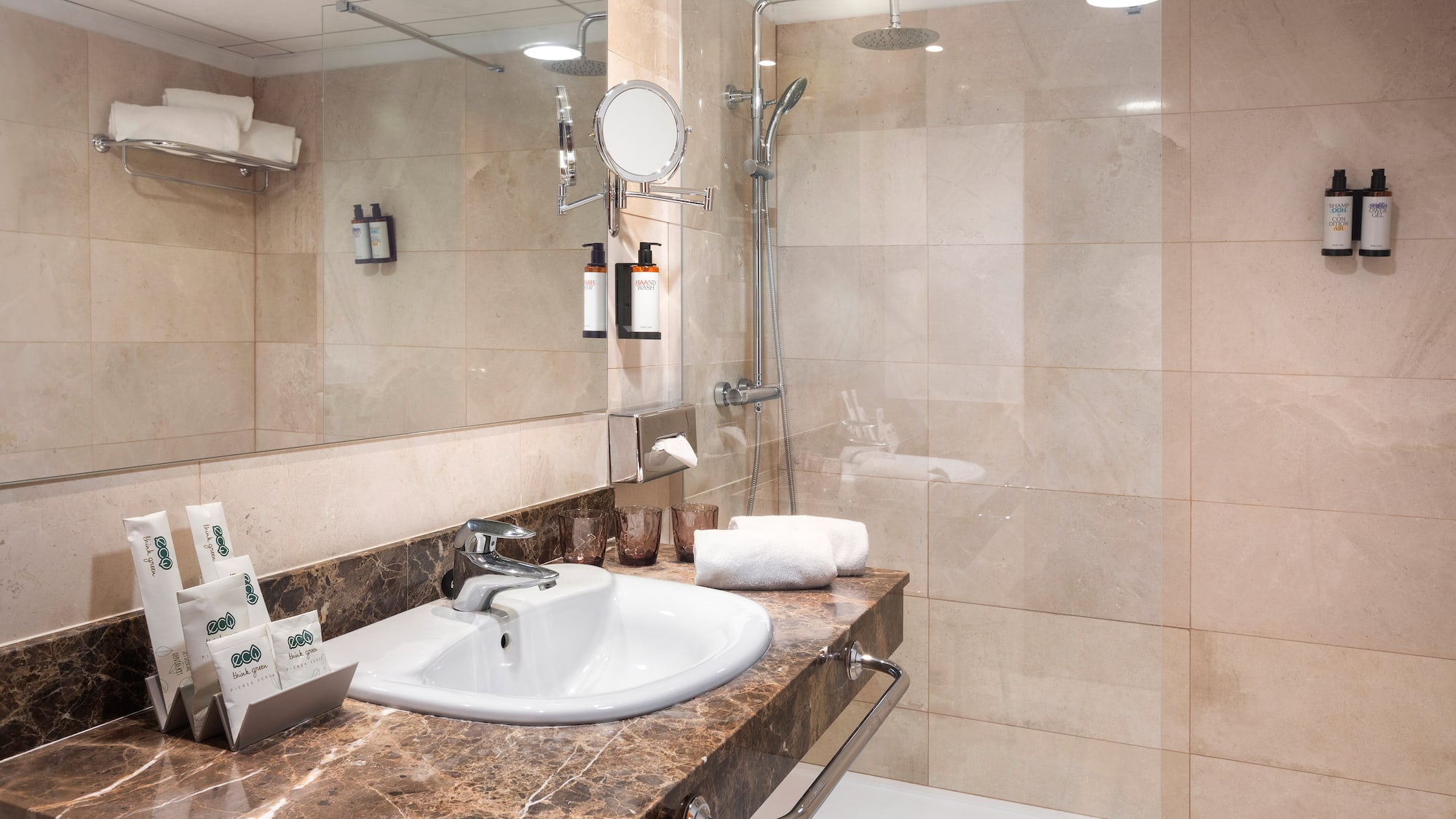 a bathroom with a shower and sink