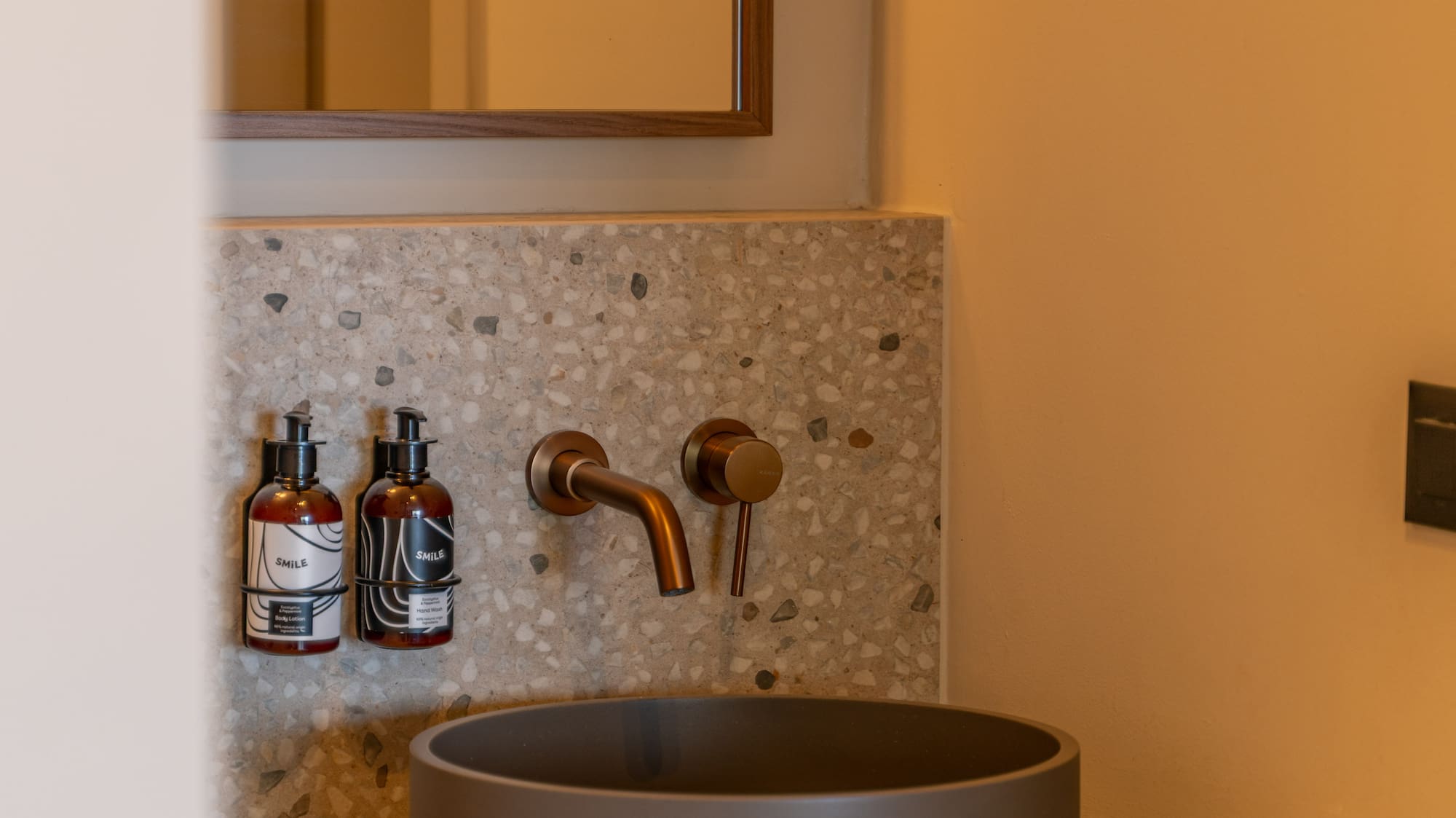 a sink and faucet in a bathroom