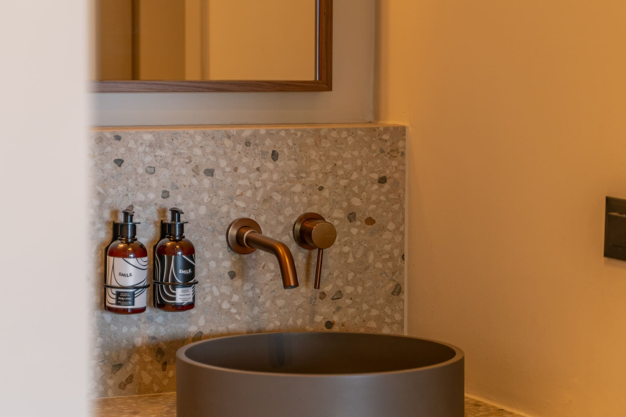 a sink and faucet in a bathroom