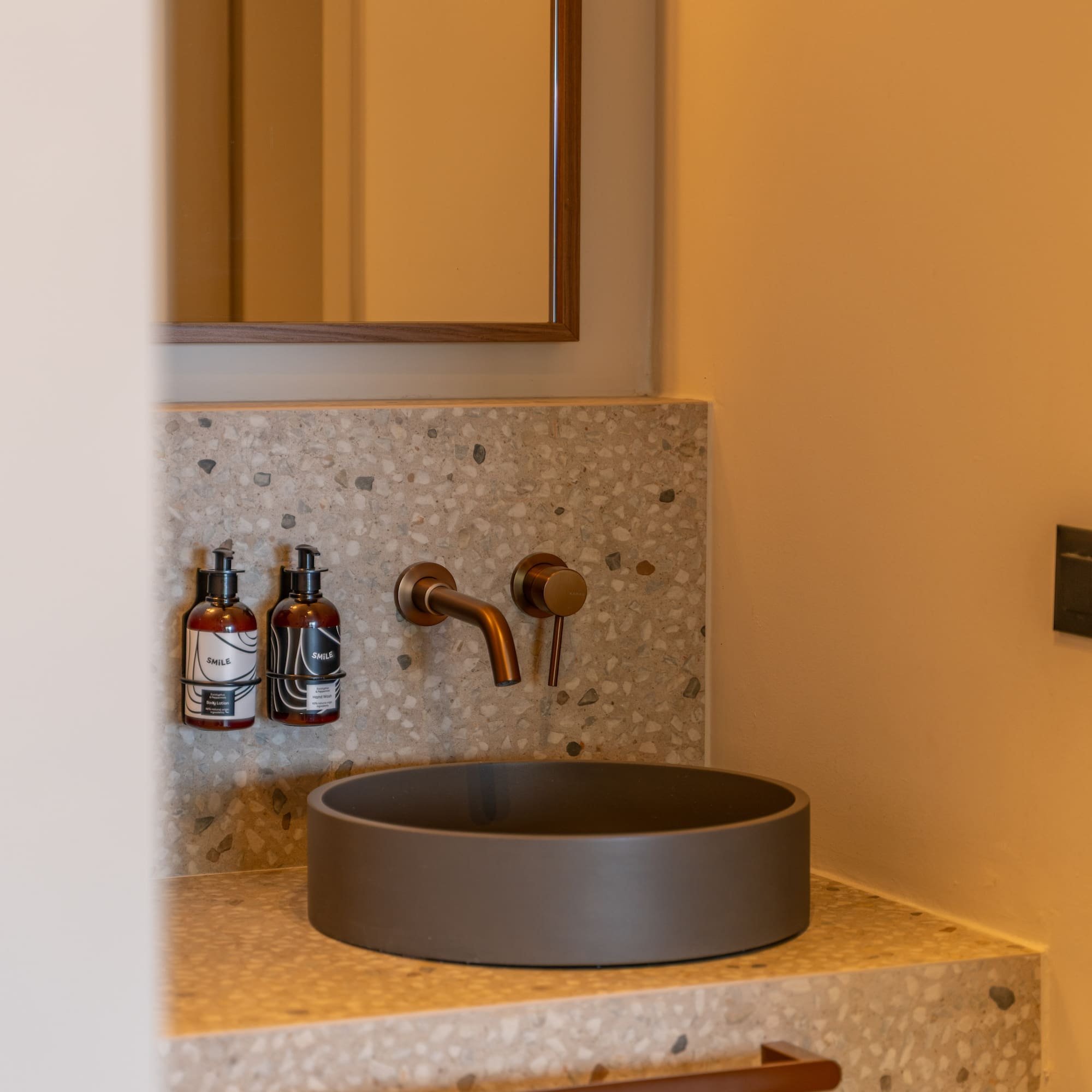 a sink and faucet in a bathroom