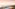 Coastal rooftop terrace with outdoor seating, ocean, beach, and sunset.