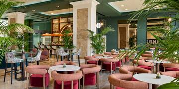 a room with tables and chairs