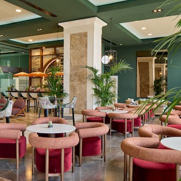a room with tables and chairs