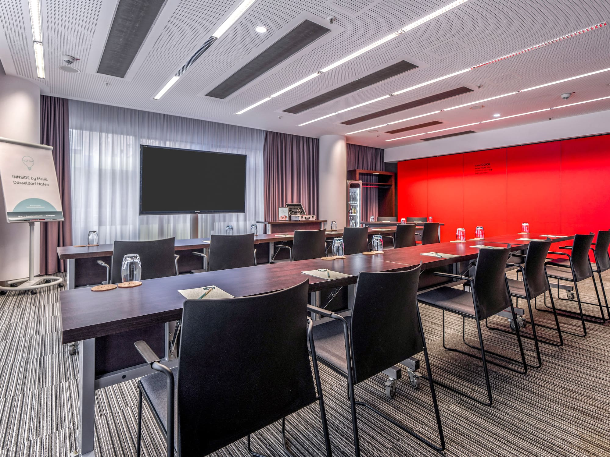 a room with a large table and chairs