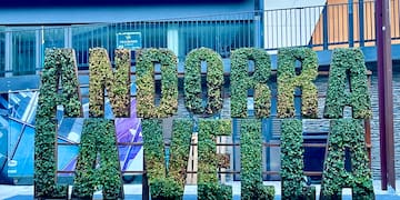 a sign with plants on it