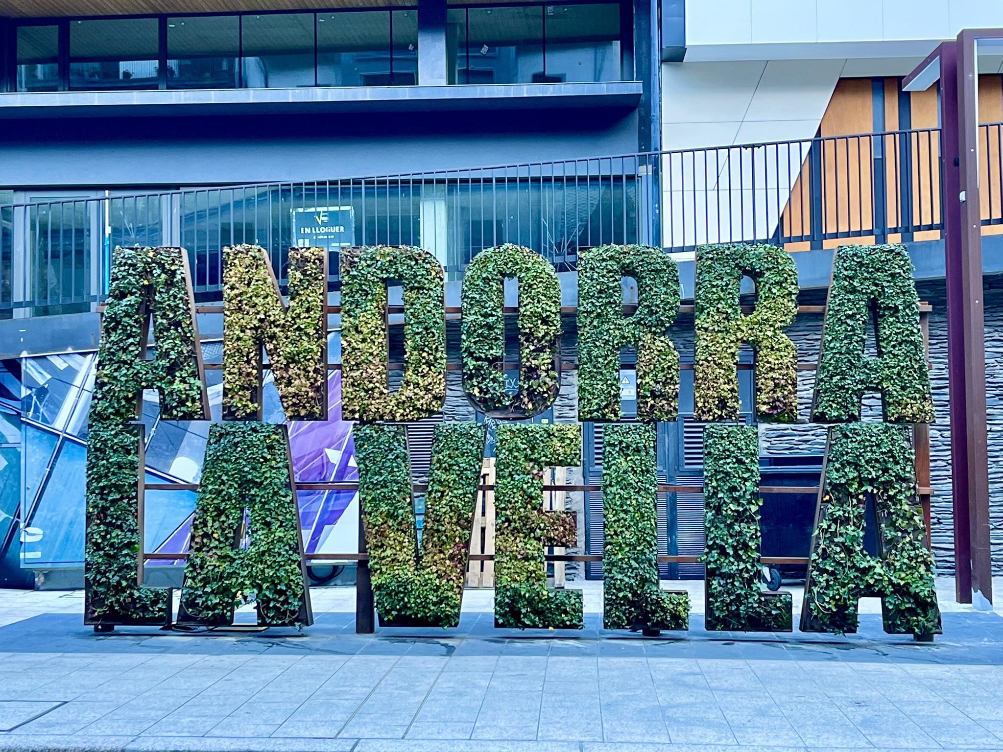 a sign with plants on it