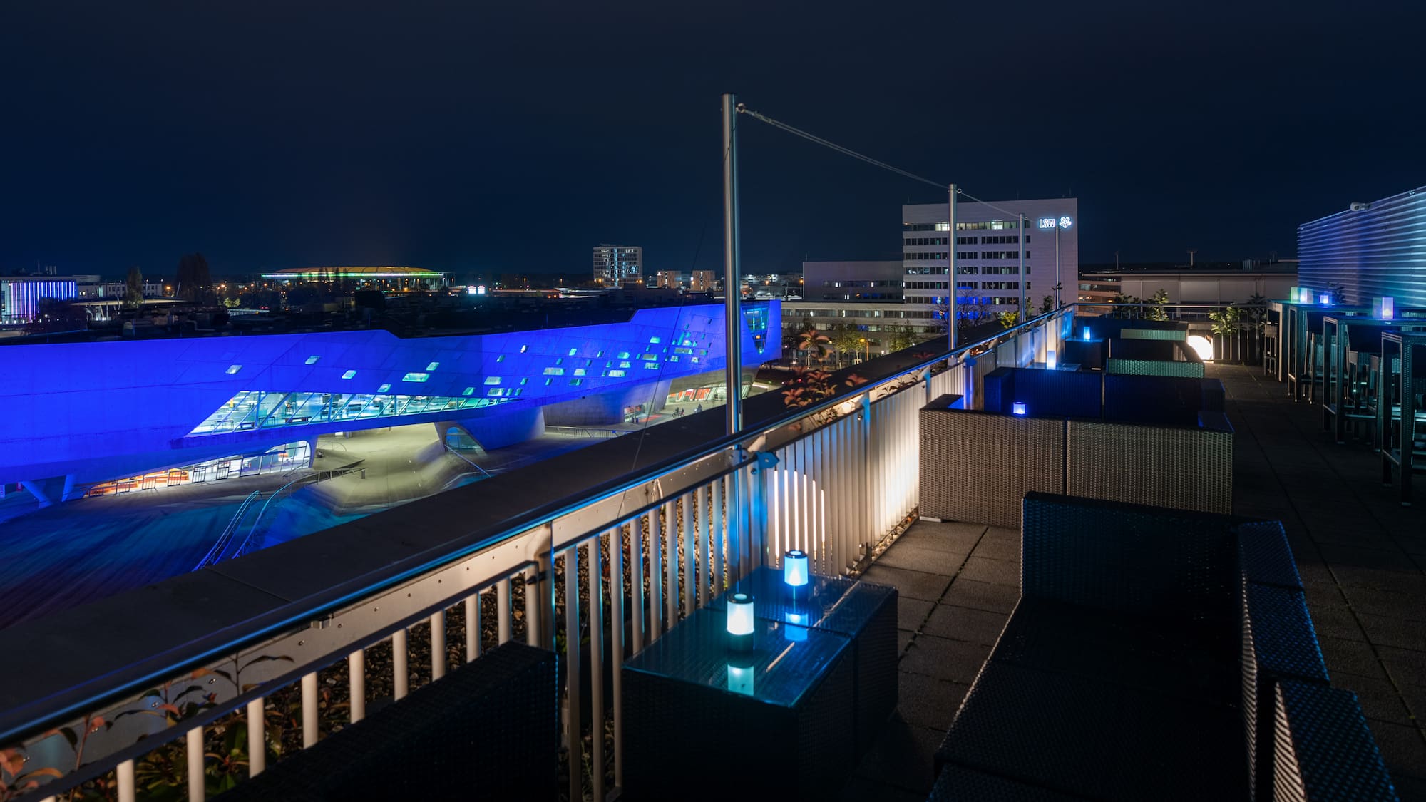 a rooftop view of a city at night