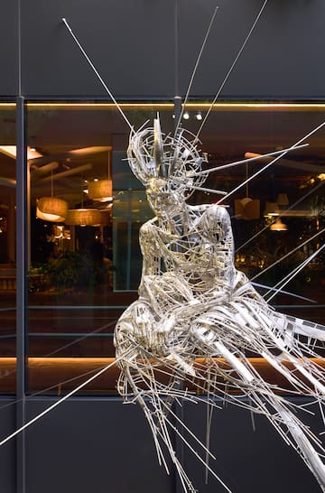 a statue of a woman in a dress