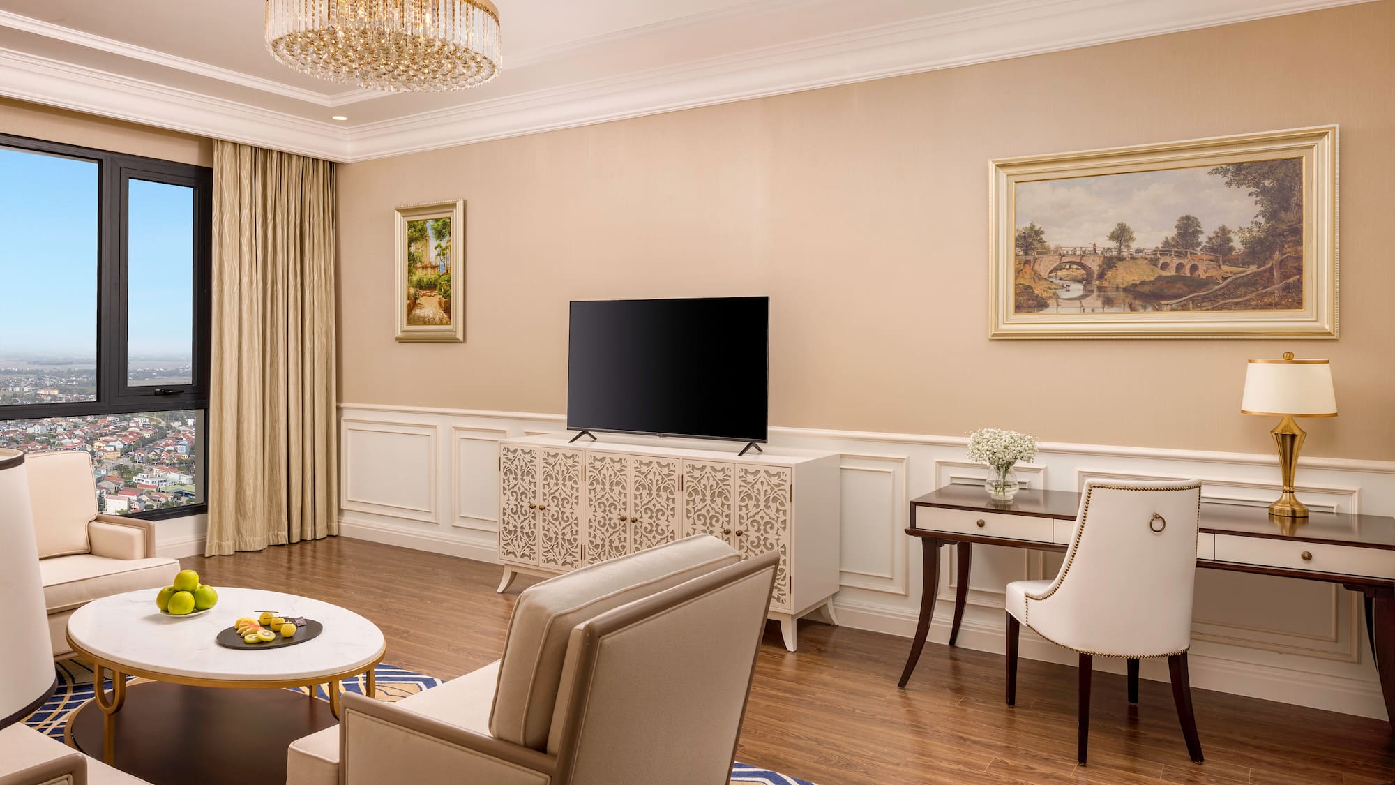 a living room with a television and a table
