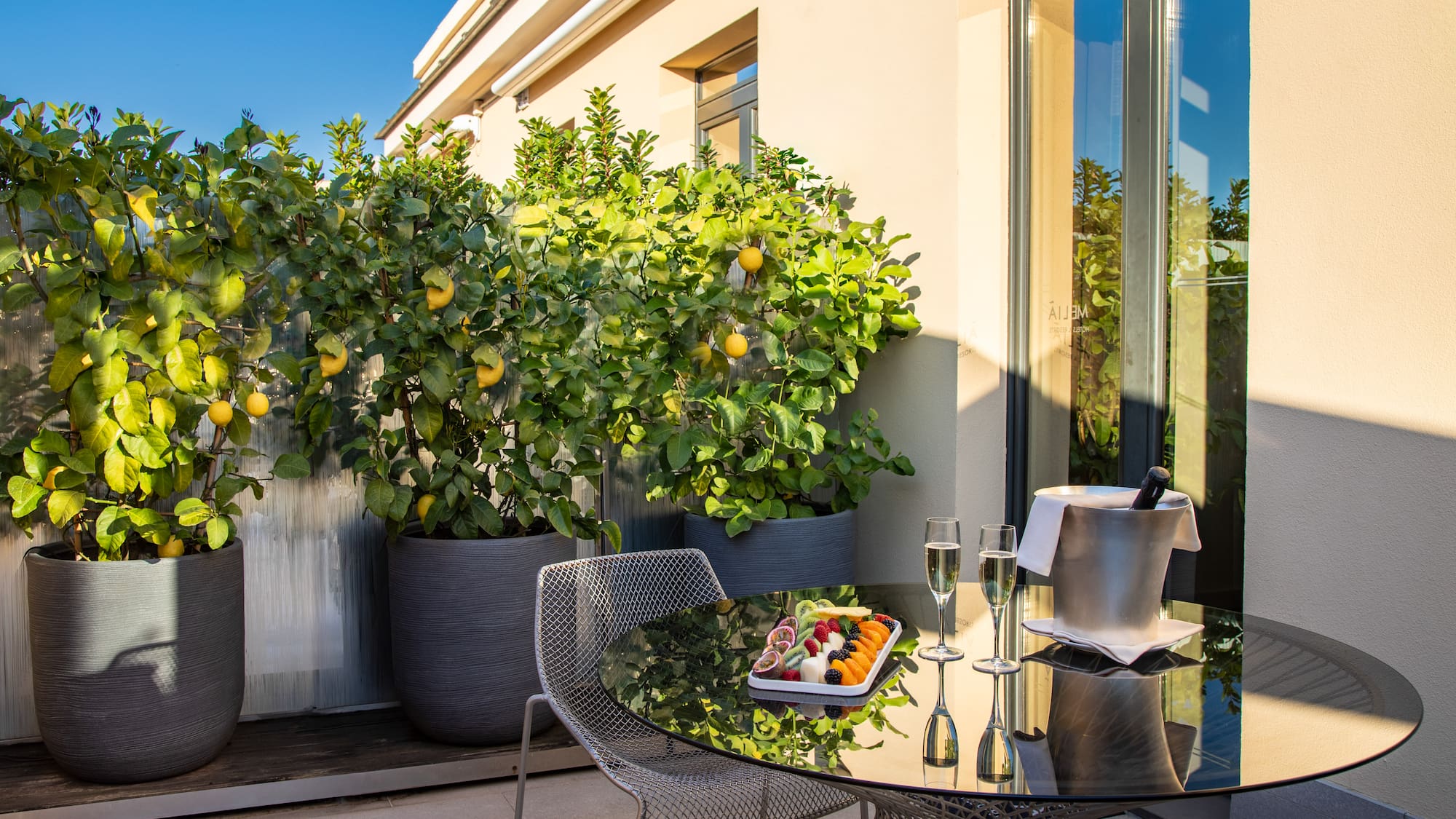 a table and chairs on a patio