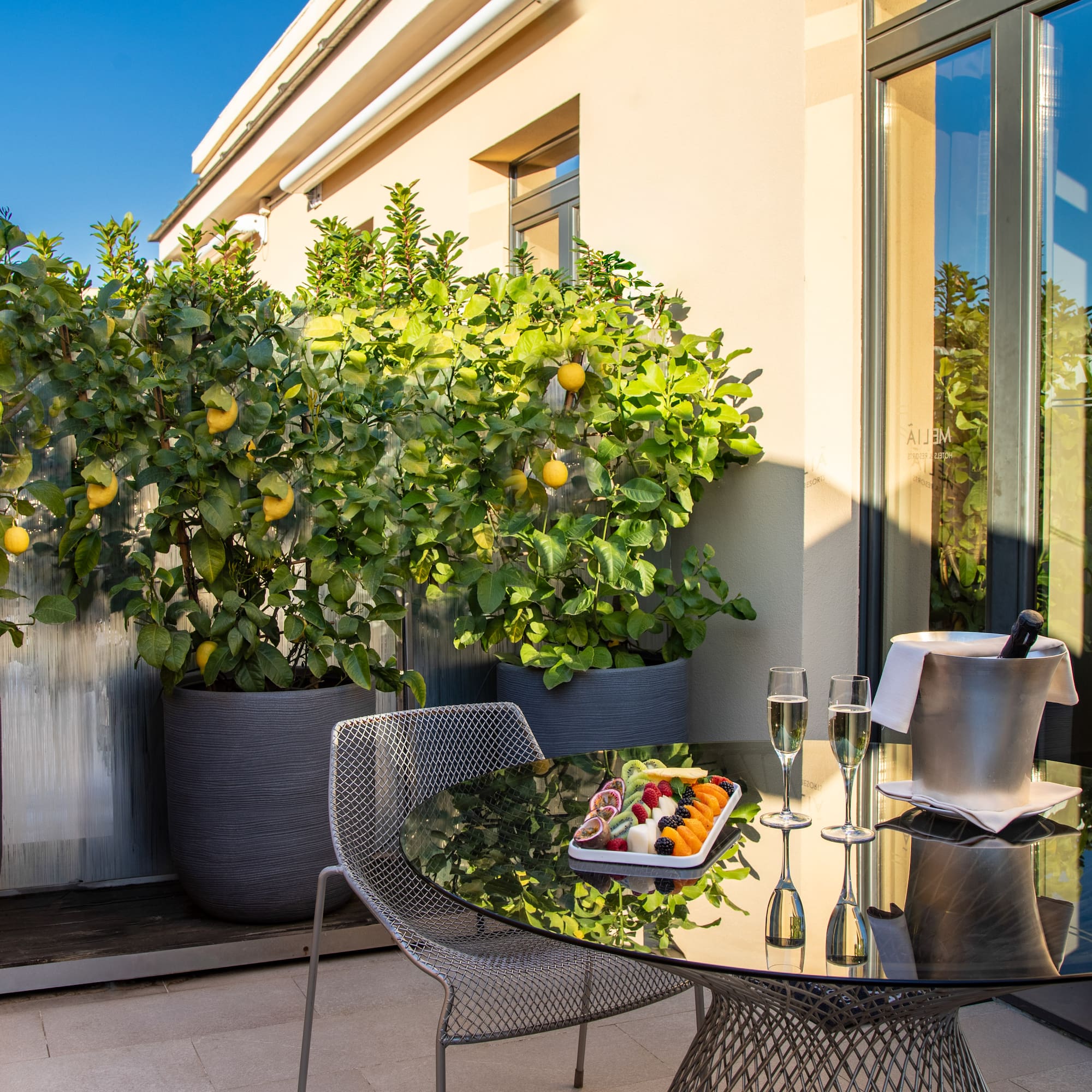 a table and chairs on a patio
