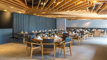 a room with tables and chairs