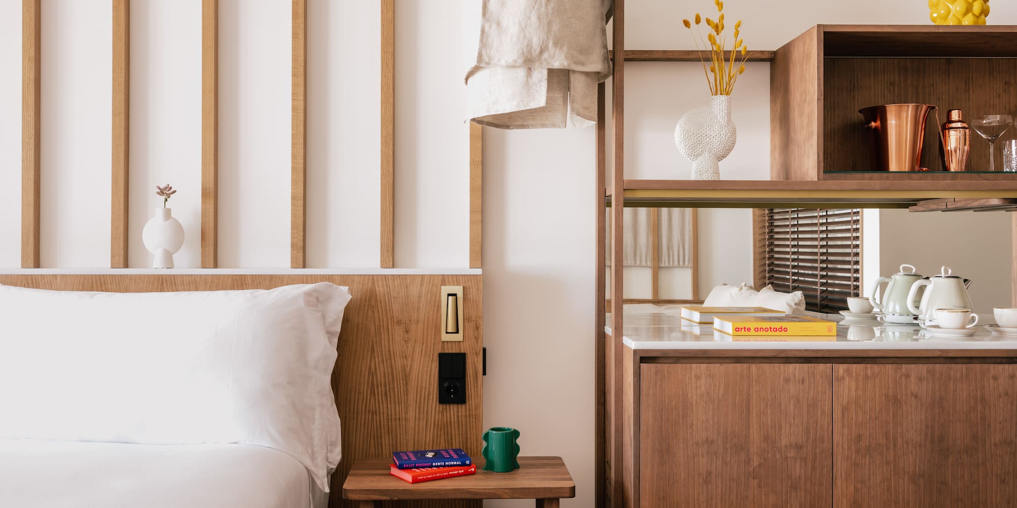 a bedroom with a bed and shelves