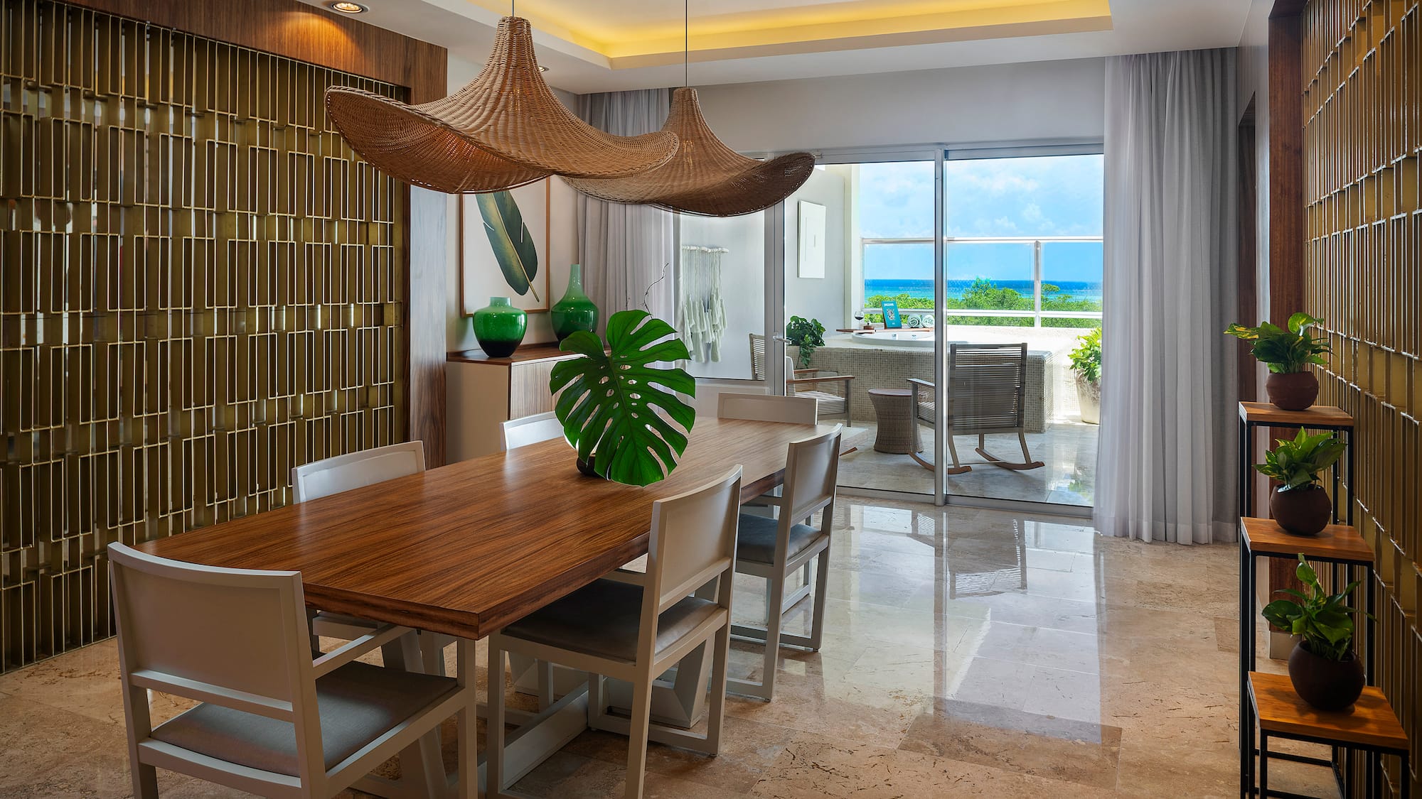 a dining room with a table and chairs
