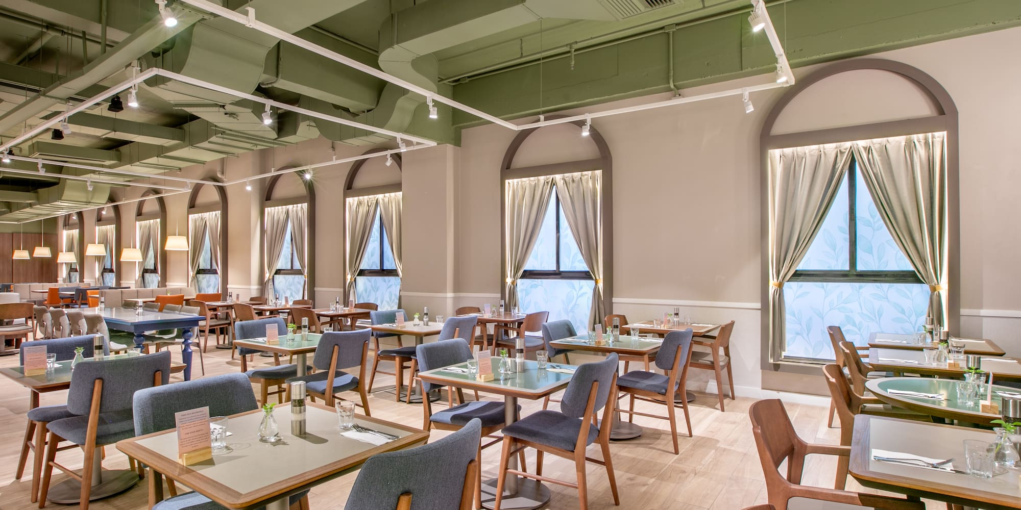 a room with tables and chairs