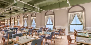 a room with tables and chairs