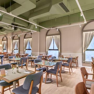 a room with tables and chairs