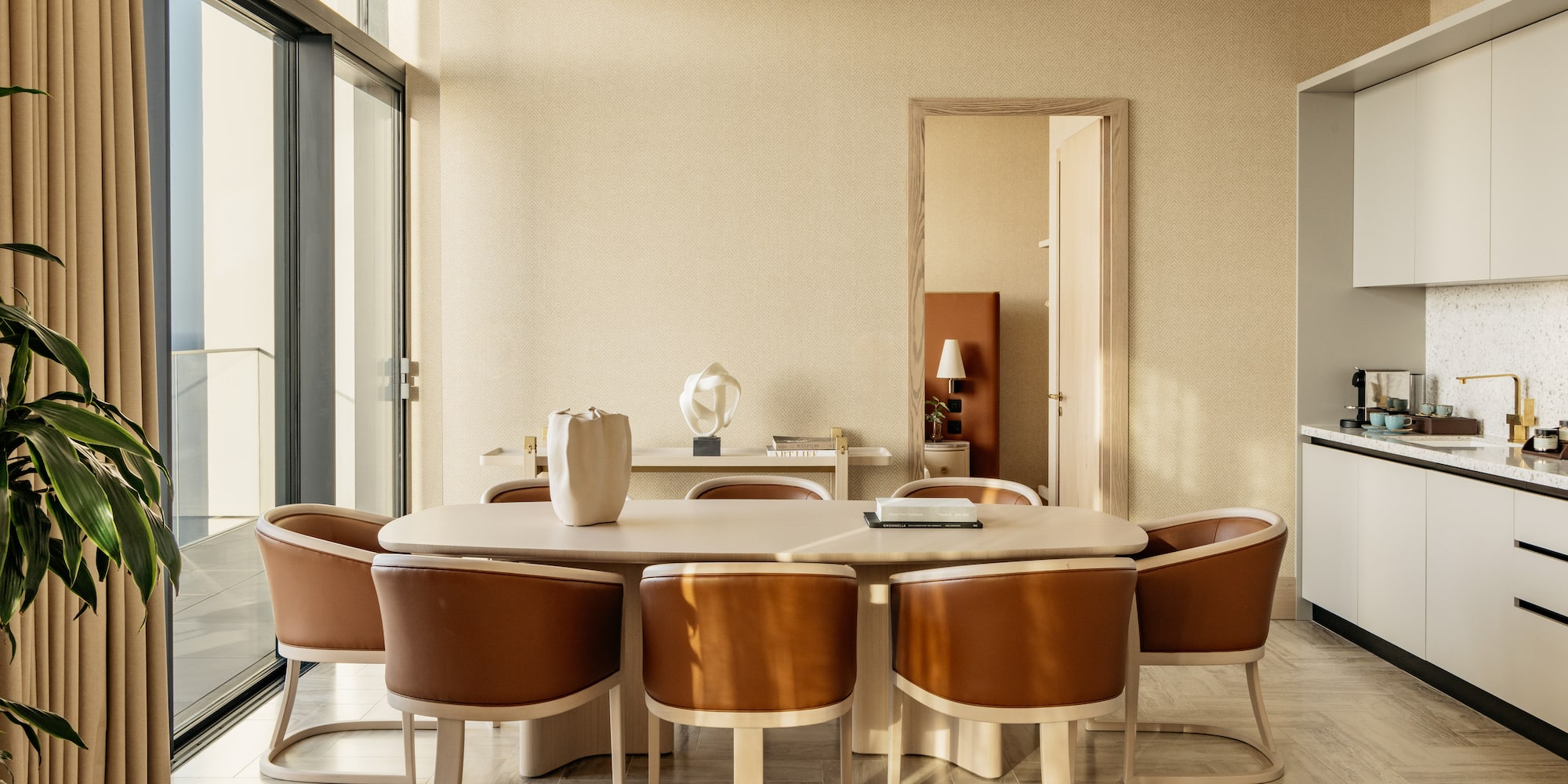 a room with a table and chairs