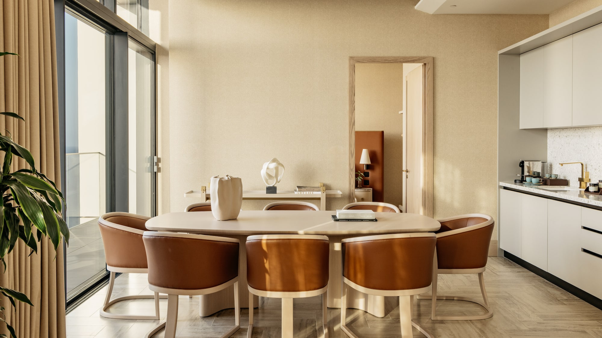 a room with a table and chairs