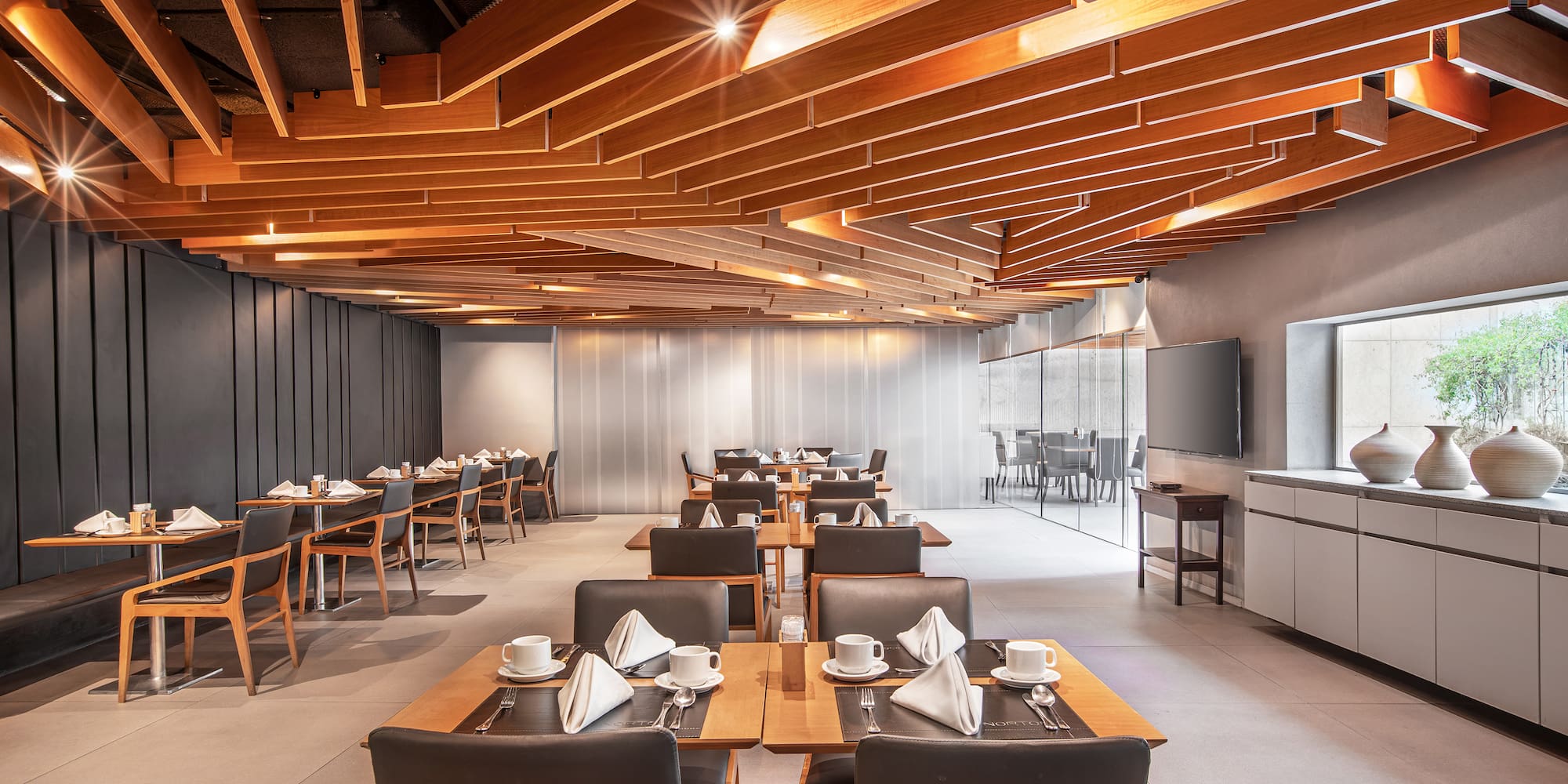 a room with tables and chairs