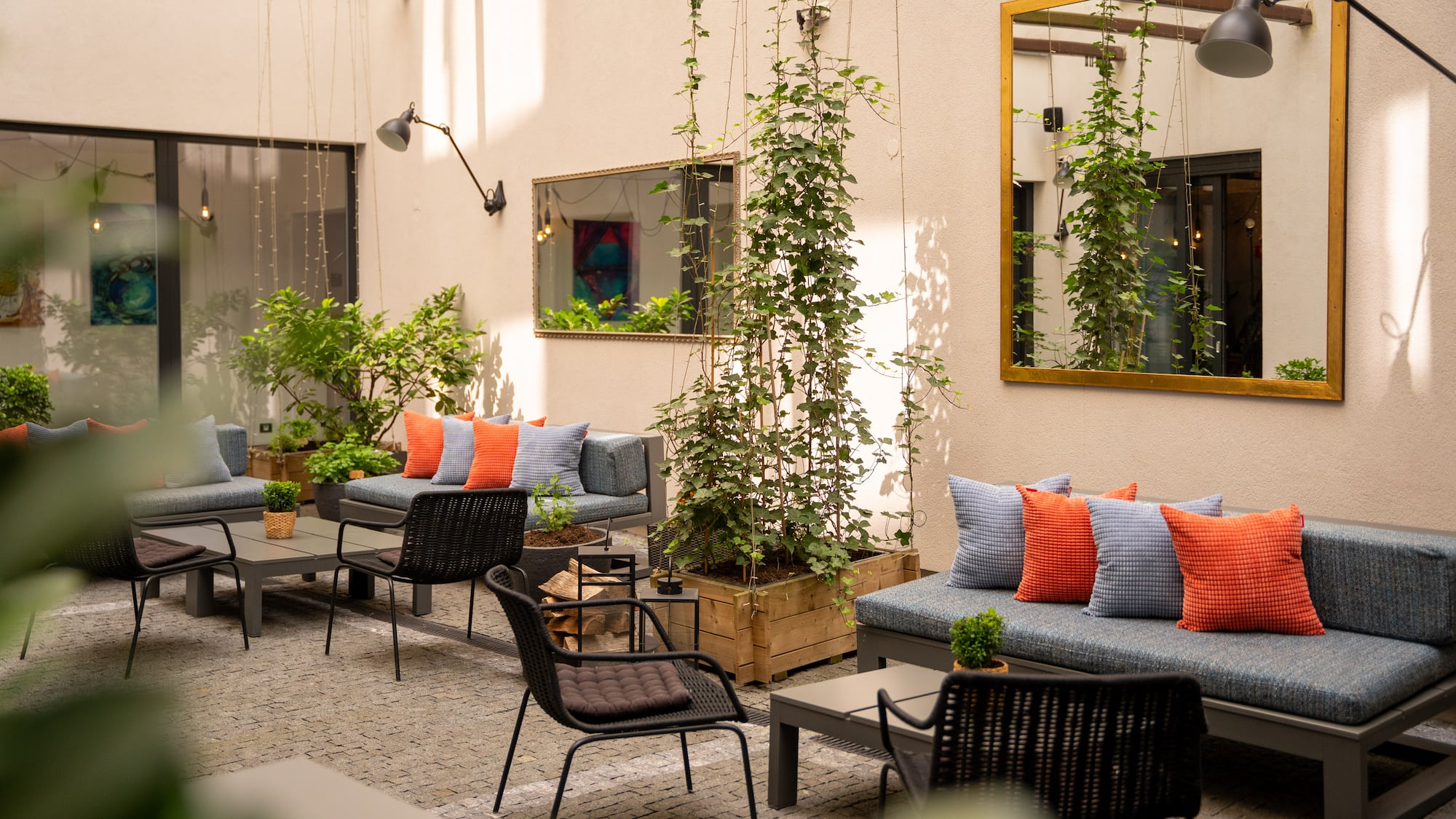a patio area with chairs and tables