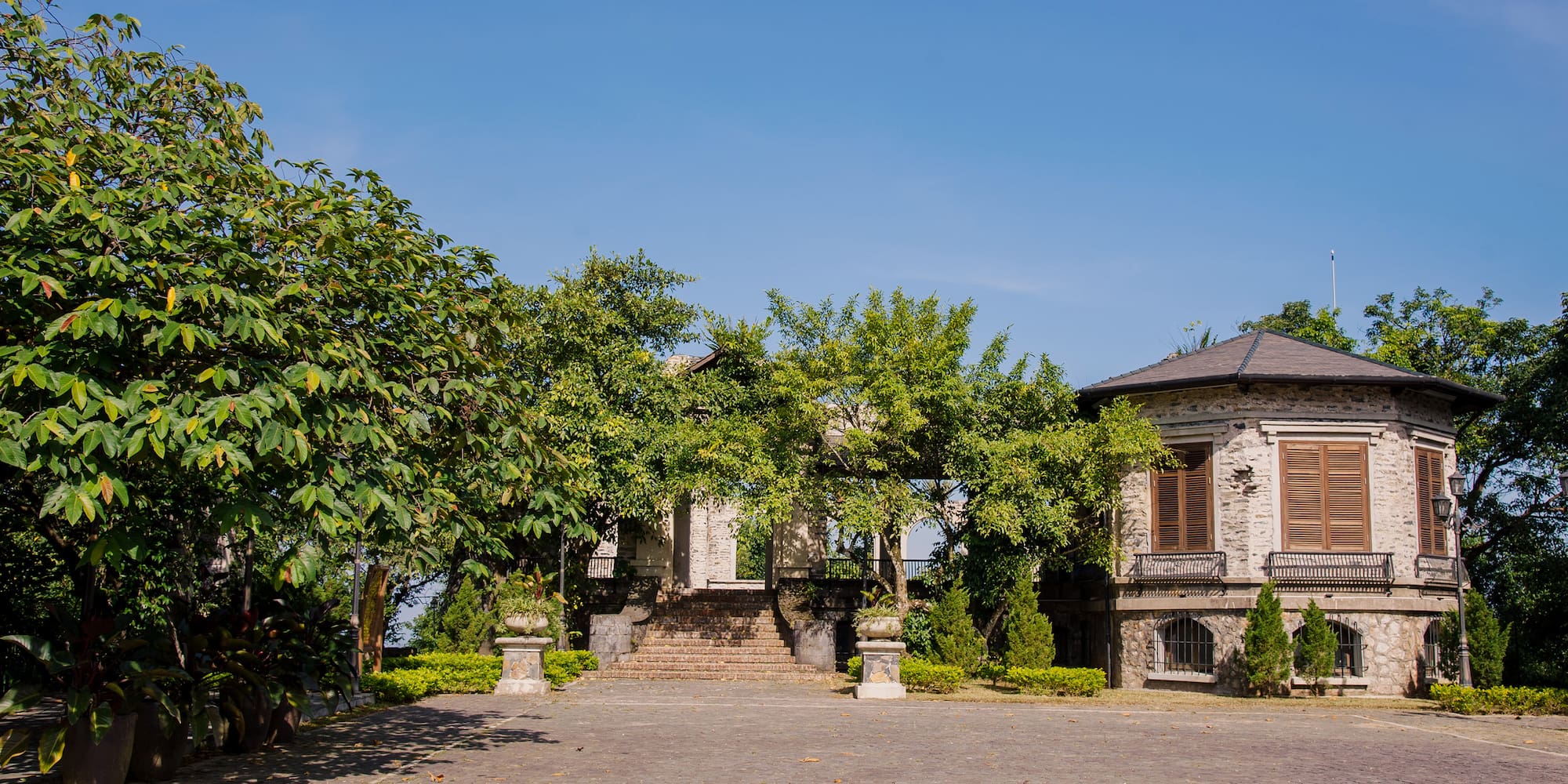a building with trees in front of it