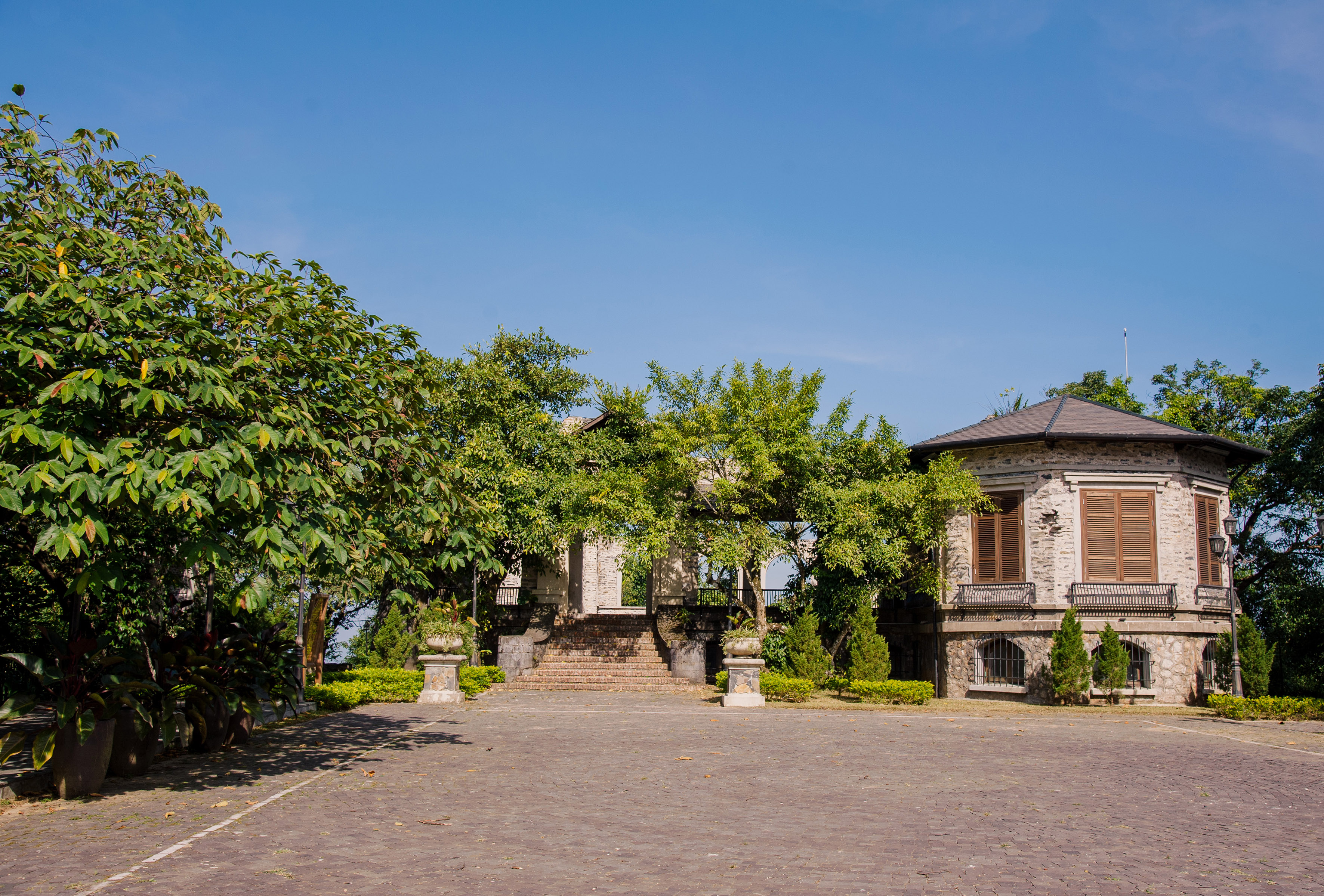 a building with trees in front of it