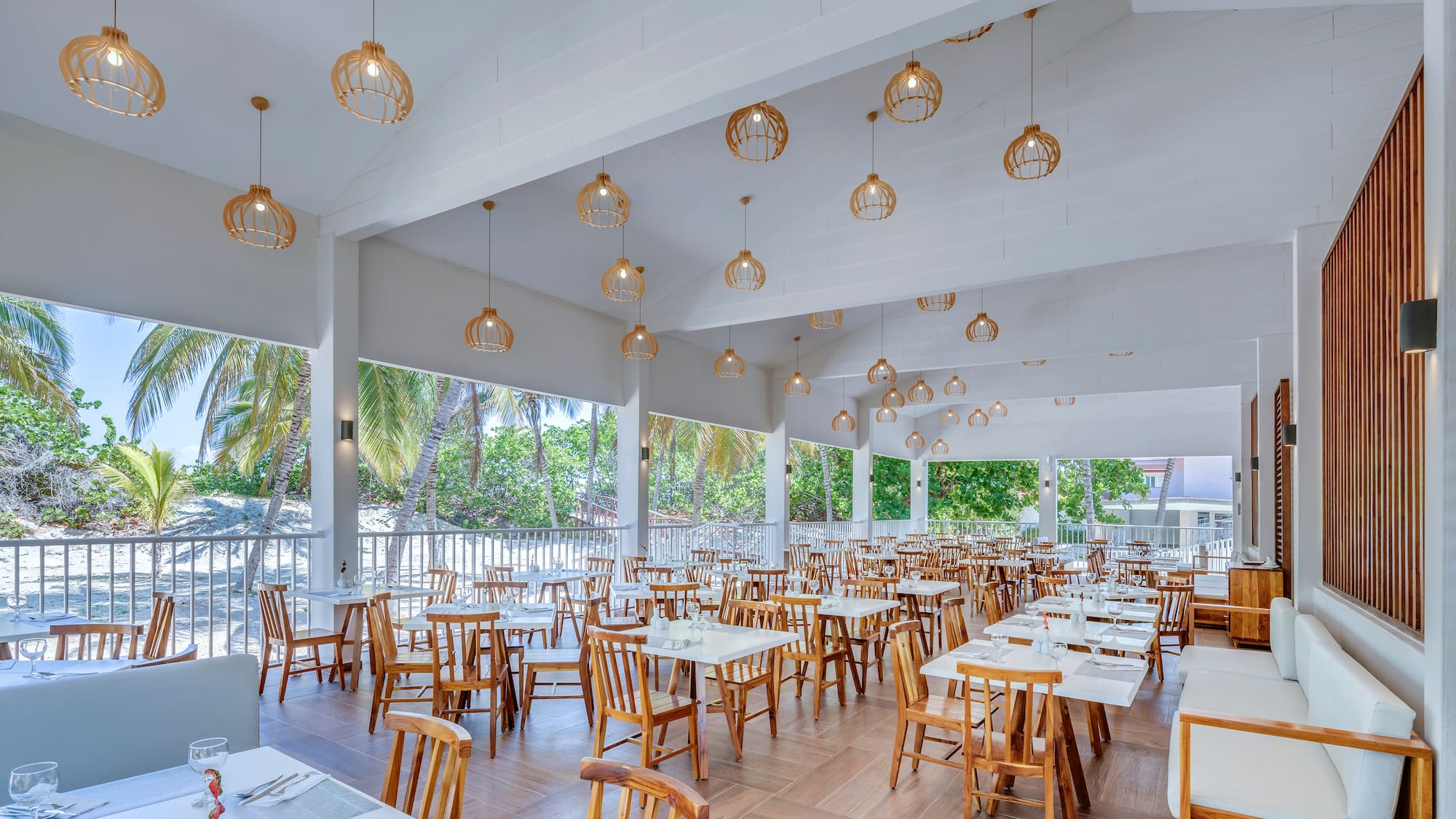 a room with tables and chairs
