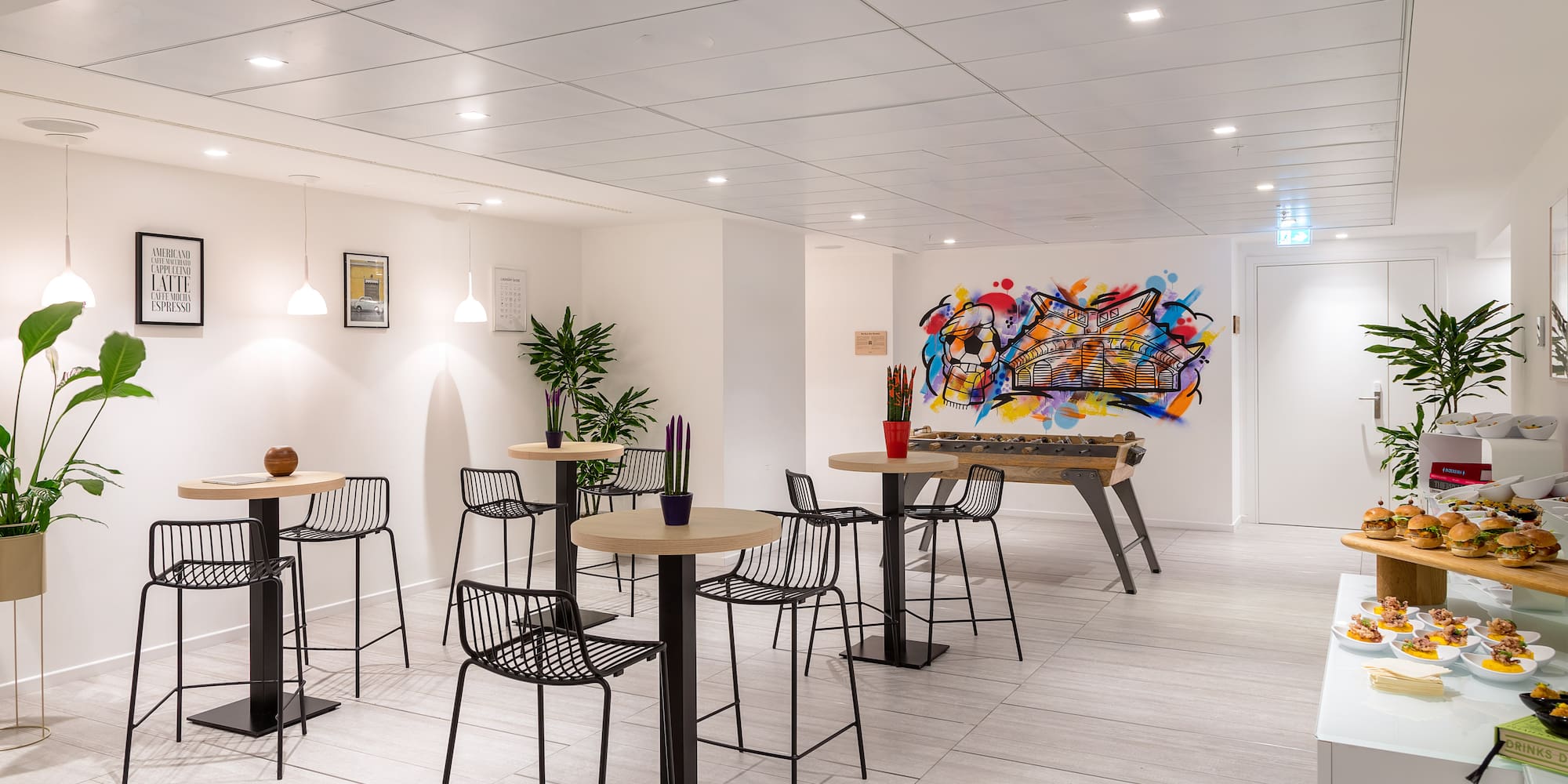 a room with tables and chairs