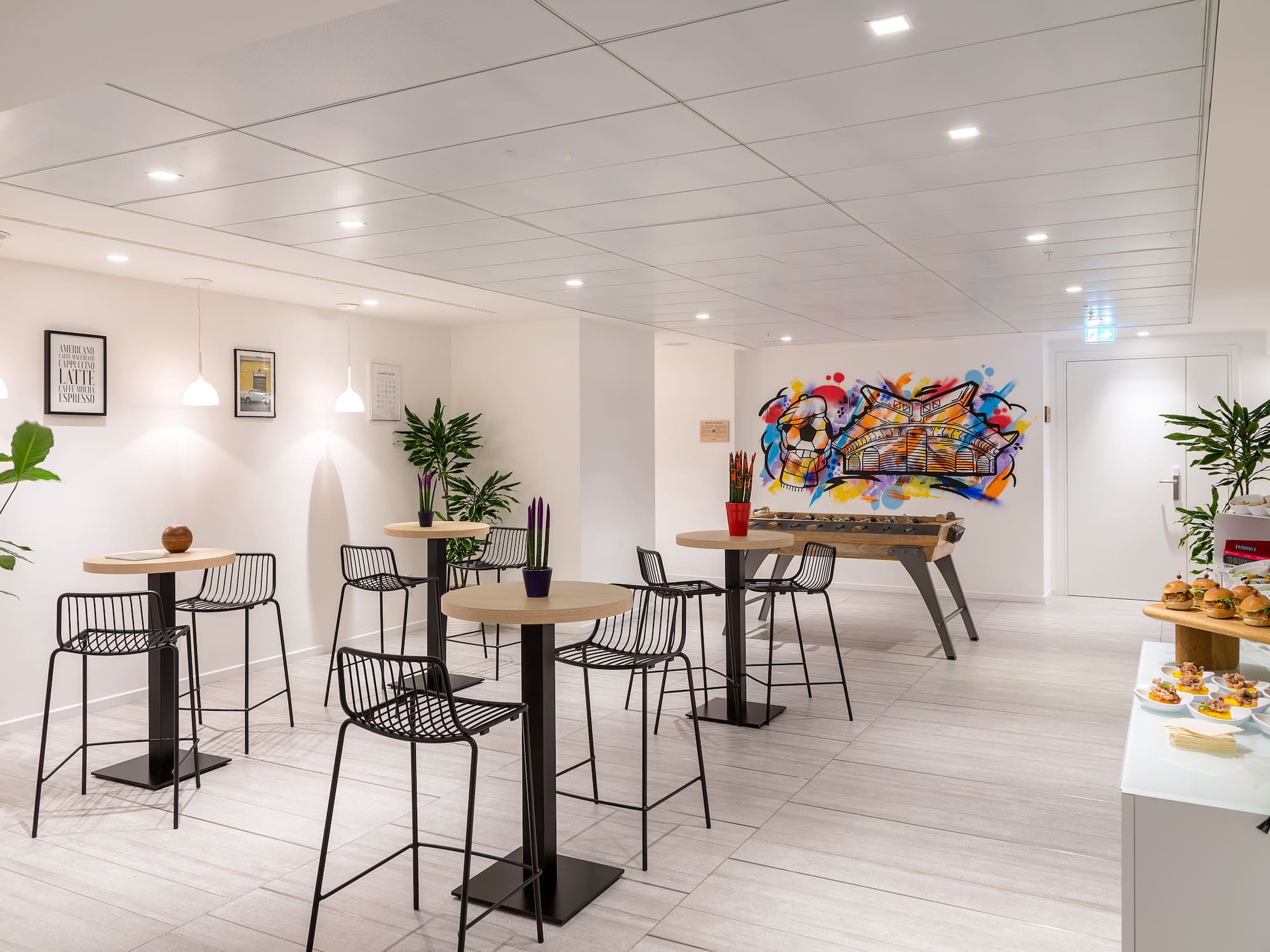 a room with tables and chairs