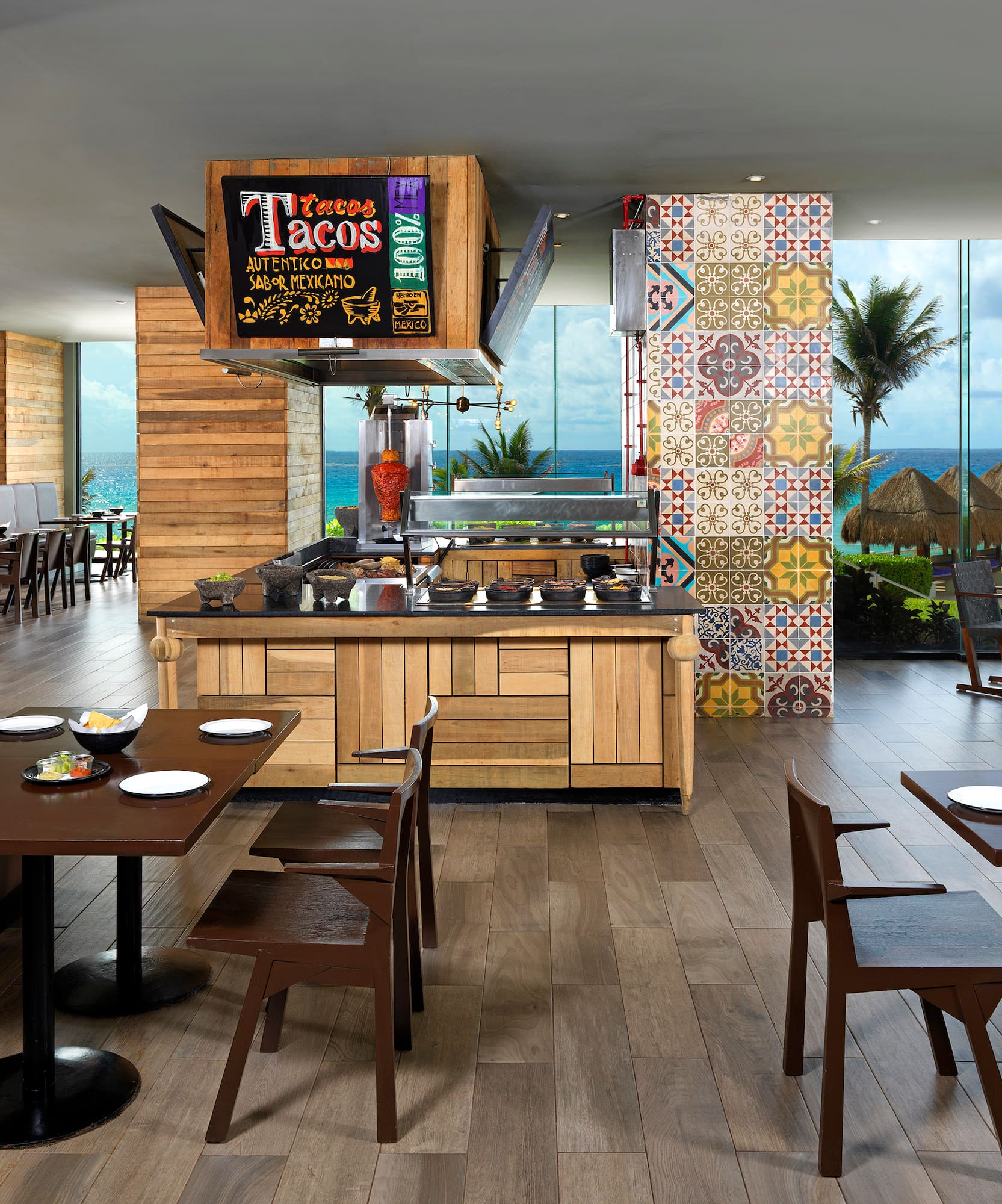 a restaurant with tables and chairs