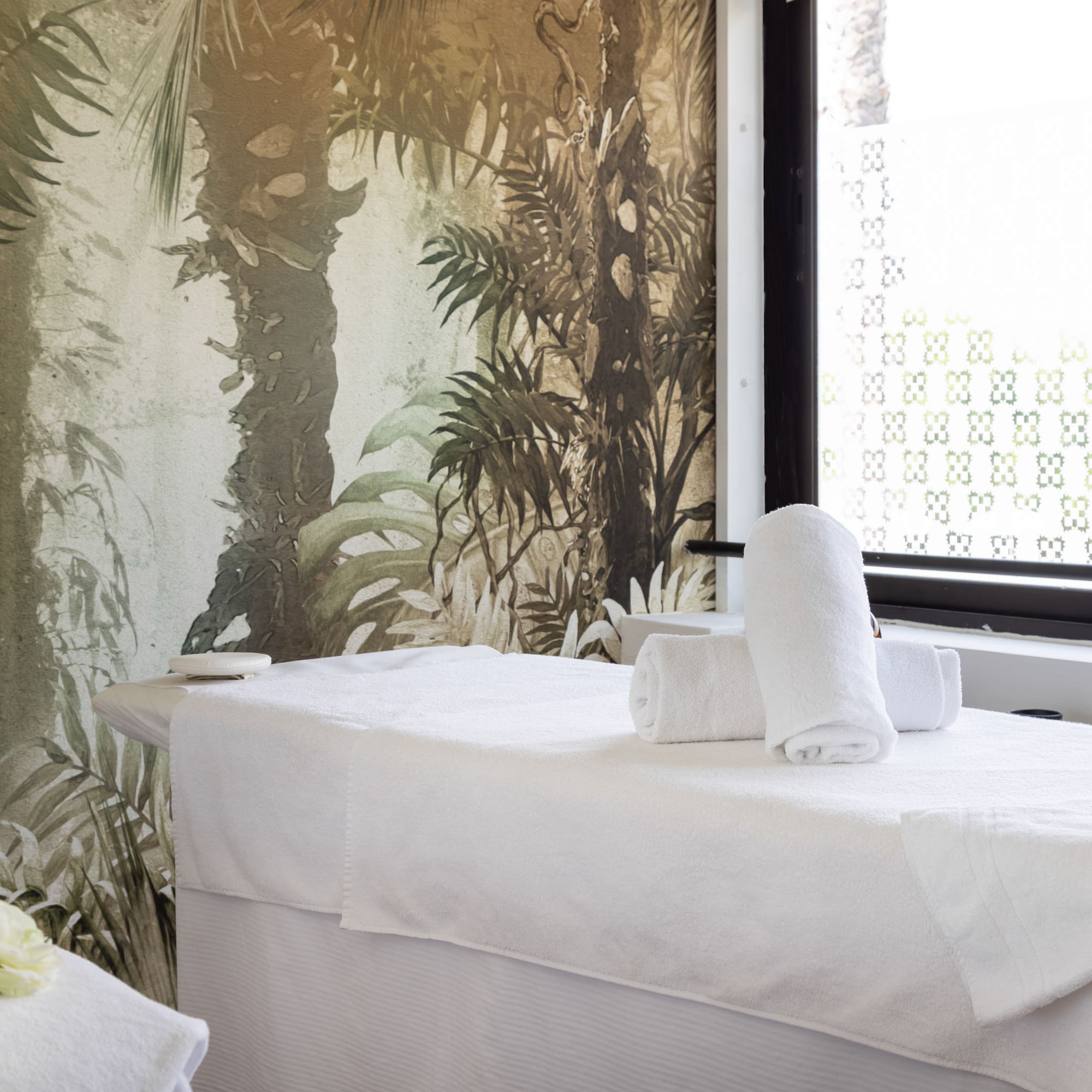 a massage table with towels on it