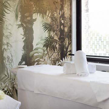 a massage table with towels on it