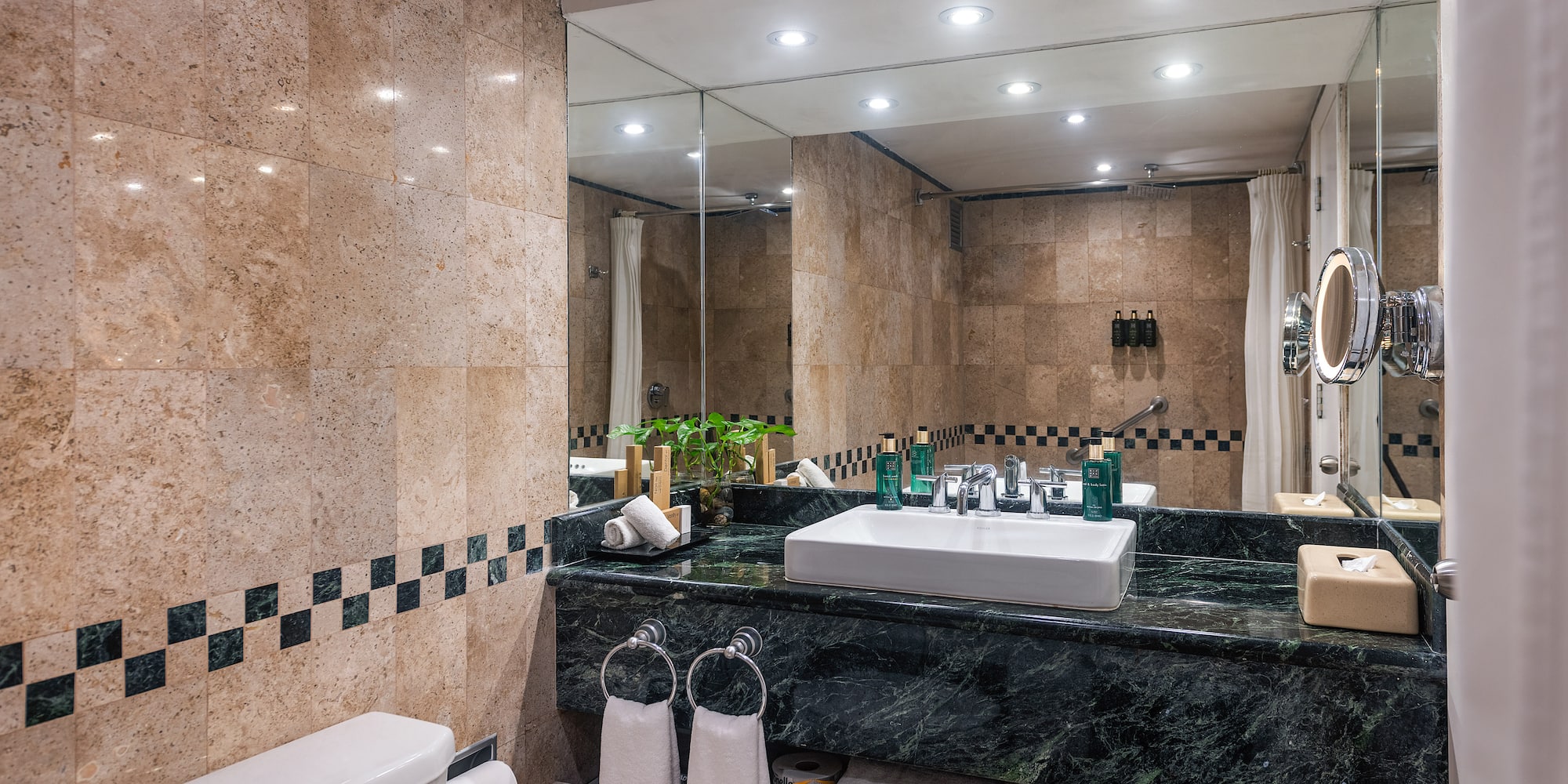 a bathroom with a sink and mirror